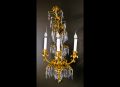 A pair of elegant Antique French Louis XVI ormolu bronze & cut crystal wall sconces.