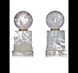Pair cut rock crystal ball ornaments.