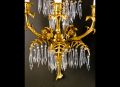 A pair of elegant Antique French Louis XVI ormolu bronze & cut crystal wall sconces.